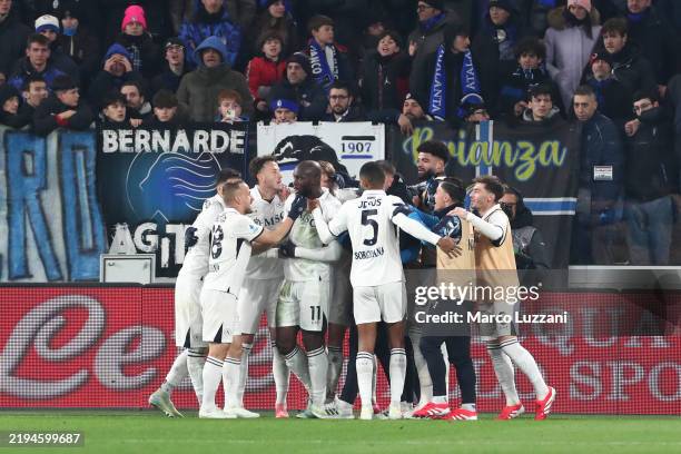 Romelu Lukaku of Napoli celebrates with teammates after scoring his team's third goal during the Serie A match between Atalanta and Napoli at Gewiss...