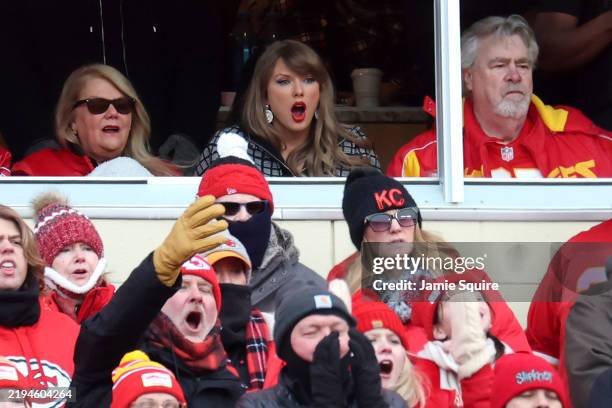 Singer-songwriter Taylor Swift reacts during the first quarter in the AFC Divisional Playoff between the Houston Texans and the Kansas City Chiefs at...