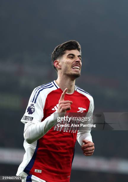 Kai Havertz of Arsenal celebrates after scoring his sides second goal during the Premier League match between Arsenal FC and Aston Villa FC at...