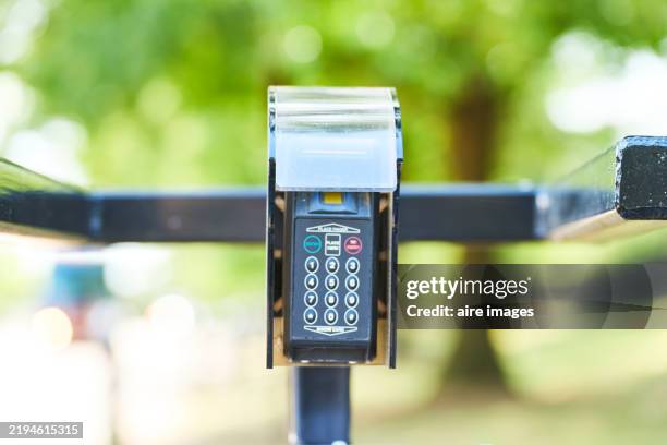 parking meter with keypad and card reader allowing access to paid parking area - ui ux button stock pictures, royalty-free photos & images