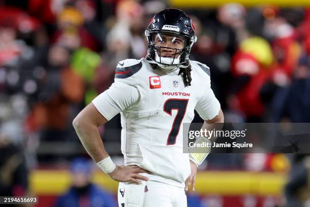 Stroud of the Houston Texans walks off the field after being sacked against the Kansas City Chiefs during the fourth quarter in the AFC Divisional...