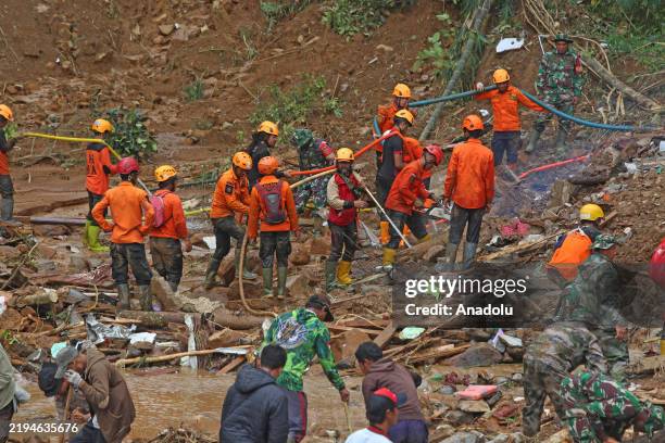 Joint officers of the National Search and Rescue Agency, Indonesian National Army, police, assisted by residents, conducted a search for victims...