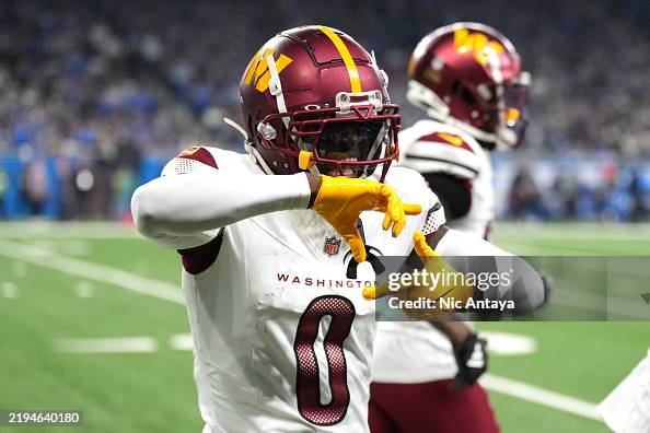 Mike Commanders Mike Sainristil of the Washington Commanders celebrates after an ...