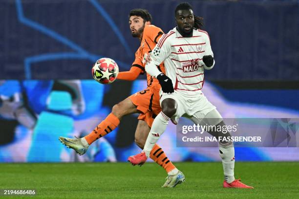 Shakhtar Donetsk's Ukrainian midfielder Taras Stepanenko and Brest's Guinea-Bissau's forward Mama Balde vie for the ball during the UEFA Champions...