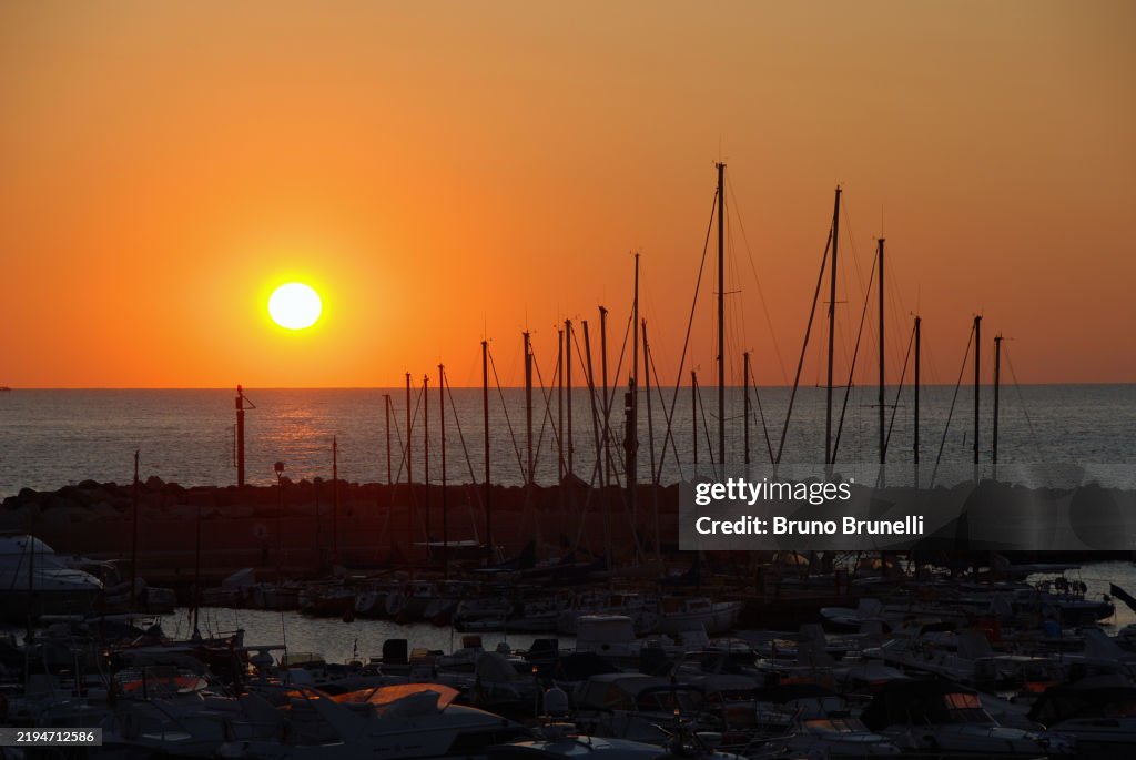 Dawn at the port of Numana. On the Conero Riviera the sun rises over the sea