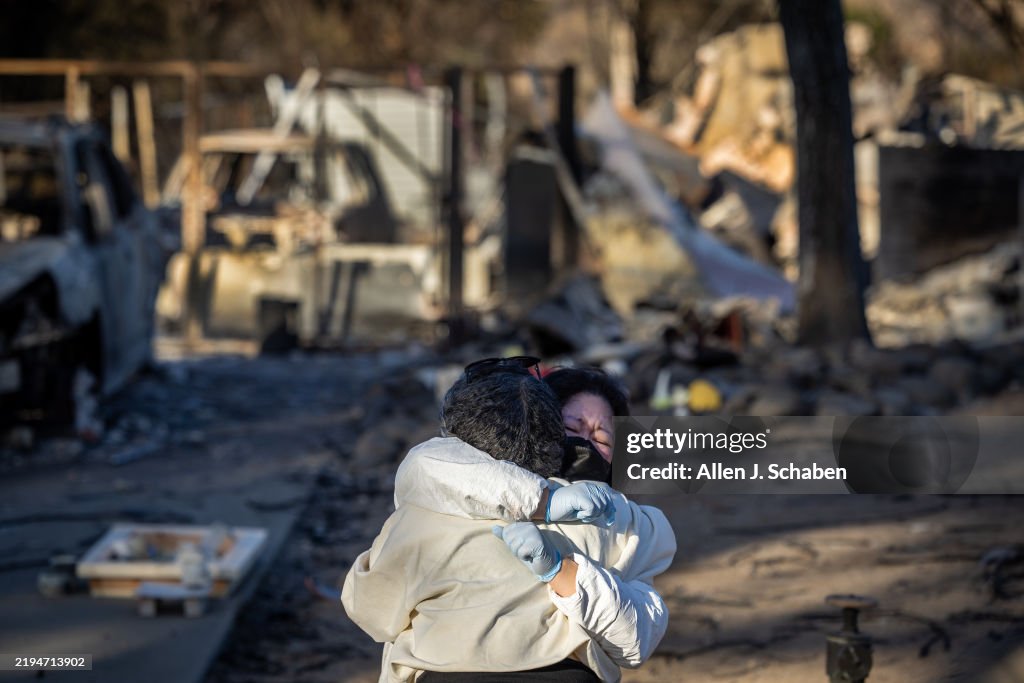 Eaton fire victims return to their burned out homes in Altadena