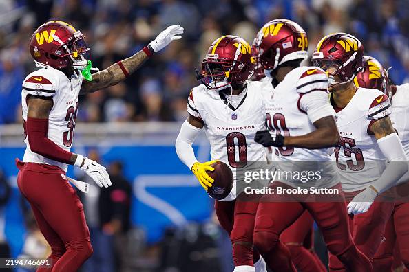 Mike Commanders Cornerback Mike Sainristil of the Washington Commanders celebrates ...