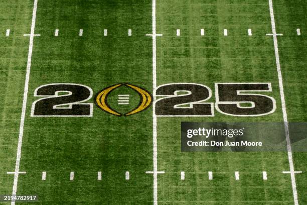 General view of the CFP logo at mid-field inside the Mercedes-Benz Stadium prior to the start of the College Football Playoffs Championship Game...