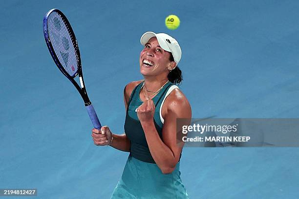 S Madison Keys celebrates beating Poland's Iga Swiatek in their women's singles semi-final match on day twelve of the Australian Open tennis...