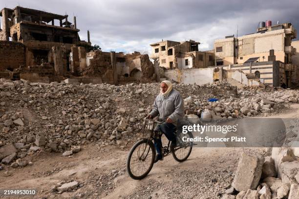 Man rides through the city of Homs on January 20, 2025 in Homs, Syria. Homs, the country’s third-largest city, has a mixed population of Sunni and...