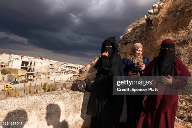 Women enjoy an afternoon in a park above the city of Homs on January 20, 2025 in Homs, Syria.Homs, the country’s third-largest city, has a mixed...