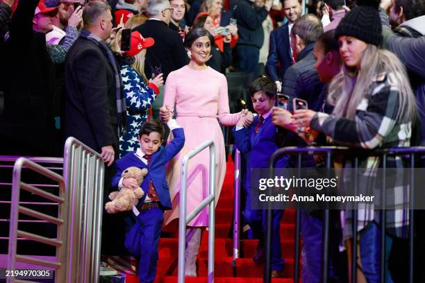 Second lady Usha Vance and her sons Ewan Vivek arrive during an indoor inauguration parade at the Capital One Arena on January 20, 2025 in...
