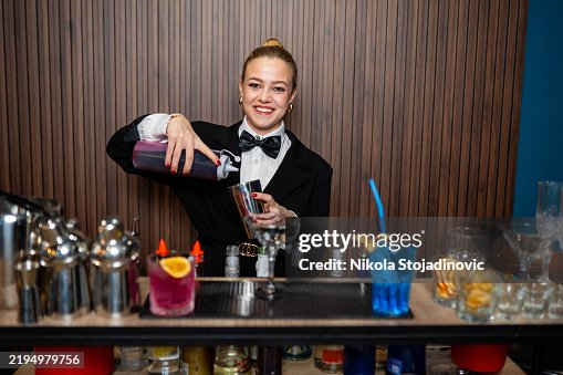 Bartender serves drinks Bartender serves drinks