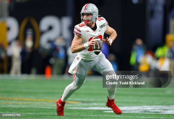 Will Howard of the Ohio State Buckeyes looks on during the first quarter against the Notre Dame Fighting Irish in the 2025 CFP National Championship...