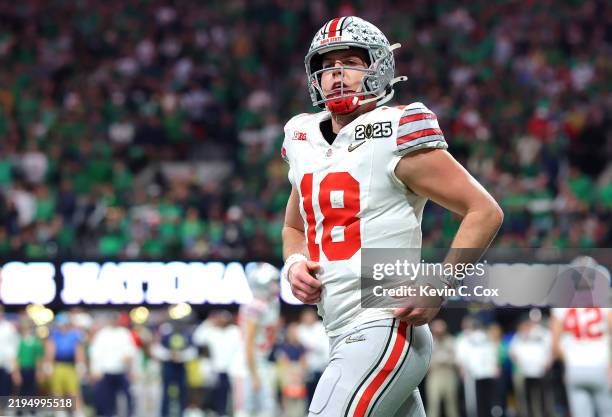 Will Howard of the Ohio State Buckeyes reacts after a second quarter touchdown against the Notre Dame Fighting Irish in the 2025 CFP National...