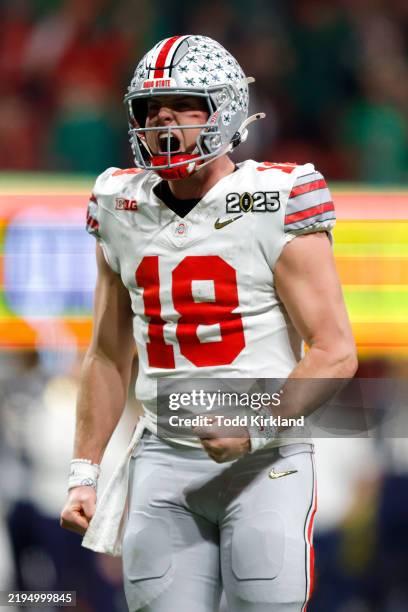 Will Howard of the Ohio State Buckeyes reacts after a touchdown against the Notre Dame Fighting Irish during the third quarter in the 2025 CFP...