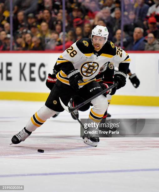 Elias Lindholm of the Boston Bruins skates through the neutral zone during the second period of game against the Ottawa Senators at Canadian Tire...