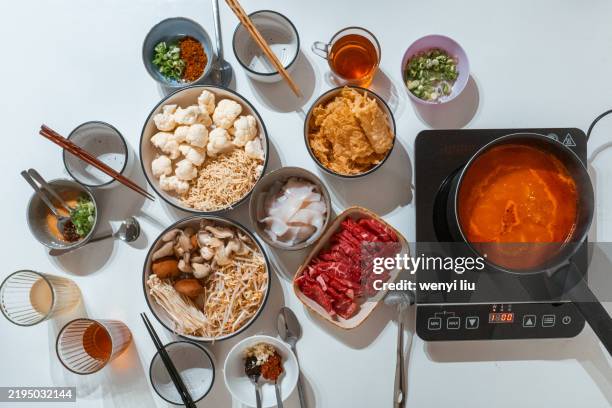 preparing for hotpot: preparing the raw food - hob nobs stock pictures, royalty-free photos & images
