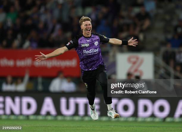 Riley Meredith of the Hurricanes celebrates after taking the wicket of Moises Henriques of the Sixers during the BBL Qualifier match between Hobart...