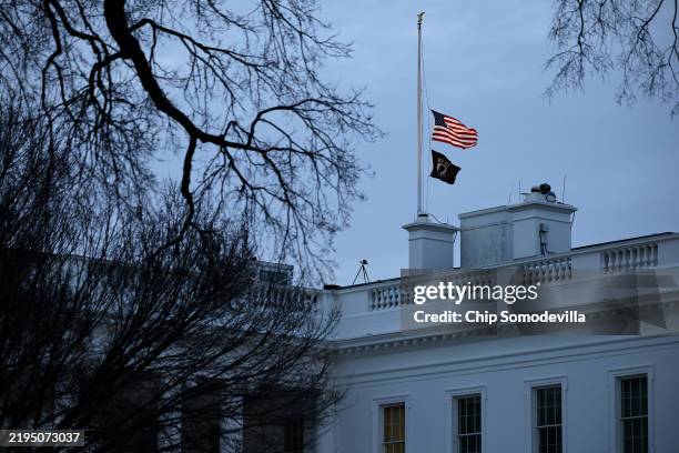 The U.S. Flag above the White House is flown at half-staff to honor the late President Jimmy Carter on the first full day of President Donald Trump's...