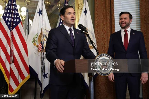 Newly confirmed U.S. Secretary of State Marco Rubio speaks as Vice President J.D. Vance listens during a swearing in ceremony at the Vice President’s...