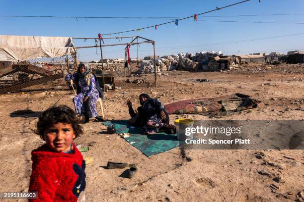 Families live at a camp on the outskirts of Homs on January 21, 2025 in Homs, Syria. Homs, the country’s third-largest city, has a mixed population...