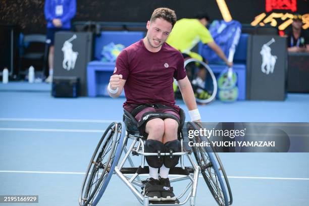 Britain's Alfie Hewett celebrates his victory against Japan's Tokito Oda in their men's wheelchair singles final match on day fourteen of the...