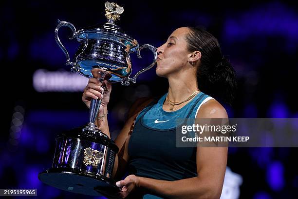 S Madison Keys celebrates with the Daphne Akhurst Memorial Cup after defeating Belarus' Aryna Sabalenka during their women's singles final match on...