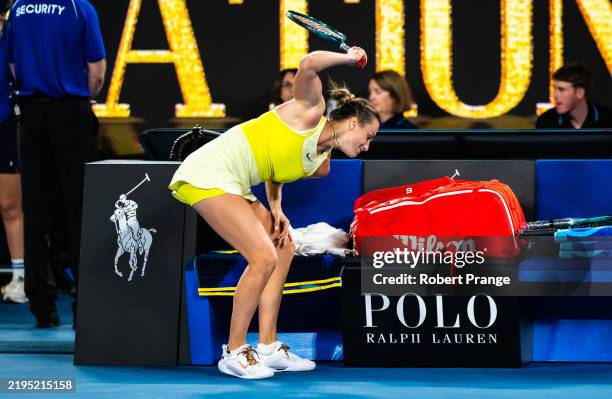 Aryna Sabalenka of Belarus destroys her racket after losing to Madison Keys of the United States in the womens final on Day 14 of the 2025 Australian...