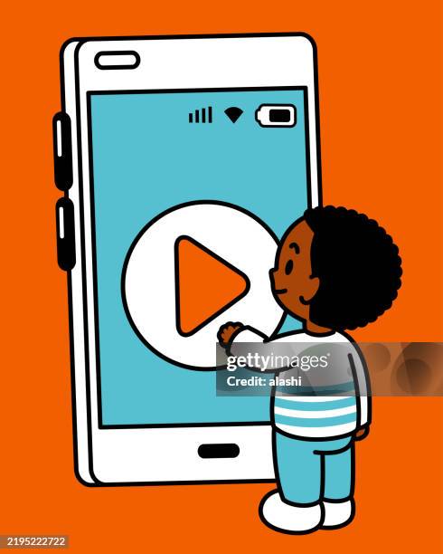 a cute black boy with short hair presses the play button on a large smartphone screen. three-quarter rear view, minimalist style, drawn in a black outline and flat colors - african american watching tv stock illustrations