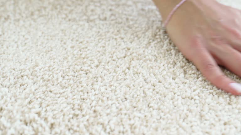 https://media.gettyimages.com/id/2195237008/video/a-womans-hand-touching-the-beige-interior-pile-carpet-made-of-polypropylene.jpg?b=1&s=640x640&k=20&c=ChDRaZuwAmy31eV5YpYrZZnoH7dg79uQGDg78Gm-R9Y=