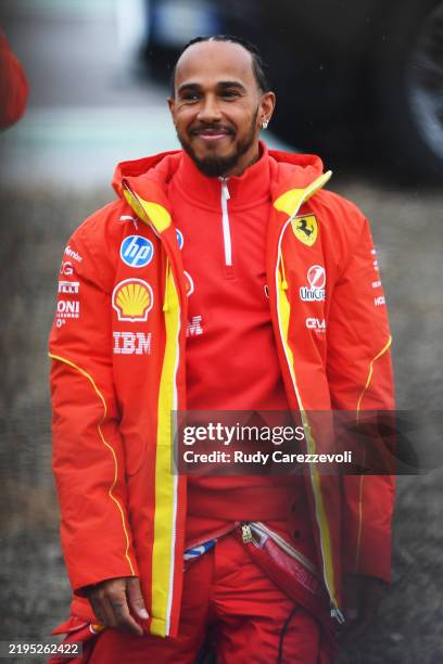 Lewis Hamilton of Great Britain and Ferrari greets the crowd during his first official days as a Scuderia Ferrari F1 driver at Fiorano Circuit on...