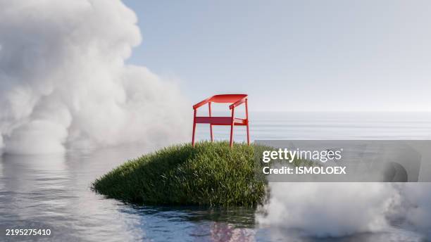 schwimmender inselstuhl in einem nebligen meer - stillleben stock-fotos und bilder