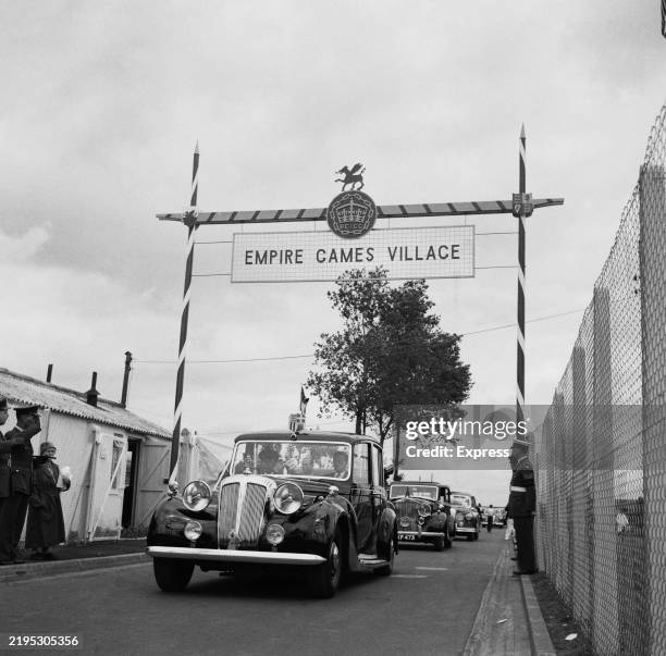 Prince Philip in the backseat of a car while visiting the British Empire and Commonwealth Games Athletes Village, Cardiff, Wales, July 17th 1958.