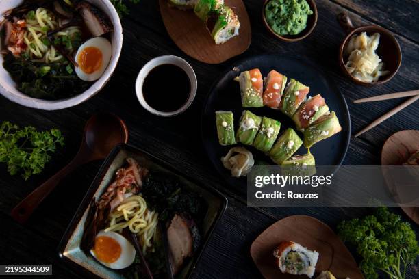 ramen and sushi set on a dark table background - japanese food stock pictures, royalty-free photos & images