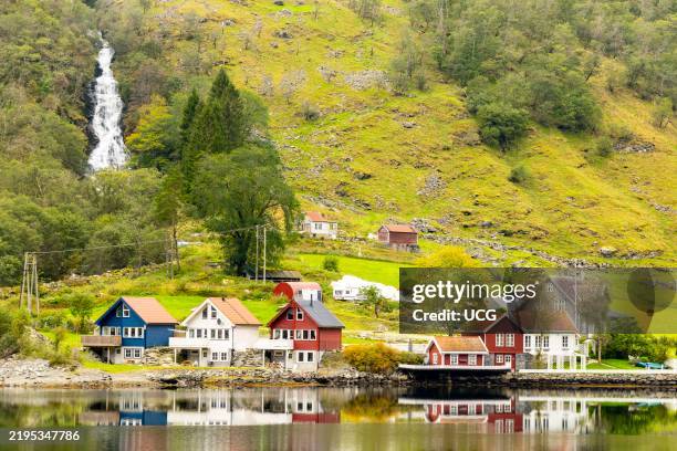 The farming village of Dyrdal on the shore of Naeroyfjord, a UNESCO world heritage fjord which is an arm of the Sognefjord.