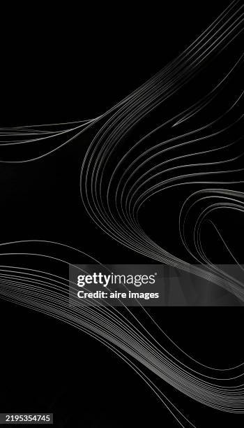 abstract white lines flowing on black background - arte minimalista fotografías e imágenes de stock