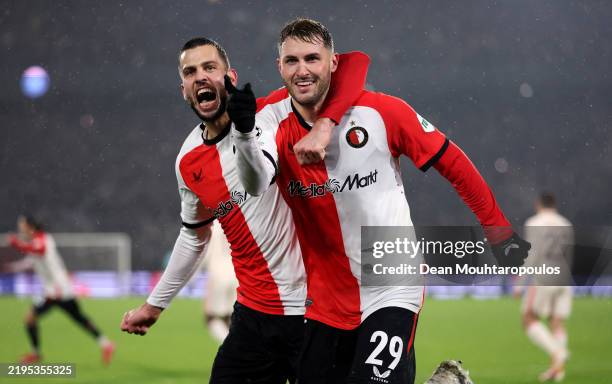 Santiago Gimenez of Feyenoord celebrates scoring his team's second goal with teammate David Hancko during the UEFA Champions League 2024/25 League...