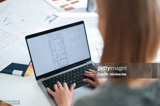 architect working on cad designs in a modern home studio workspace - prototype stock pictures, royalty-free photos & images