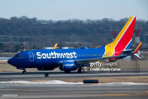 Southwest Airlines Boeing 737-7H4 departs Ronald Reagan Washington National Airport for Houston on January 22, 2025 in Arlington, Virginia.