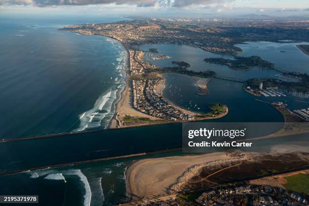In an aerial view, the Mission Bay opening, along with Mission Beach, Pacific Beach and La Jolla are seen on a winter morning on January 17, 2025 in...