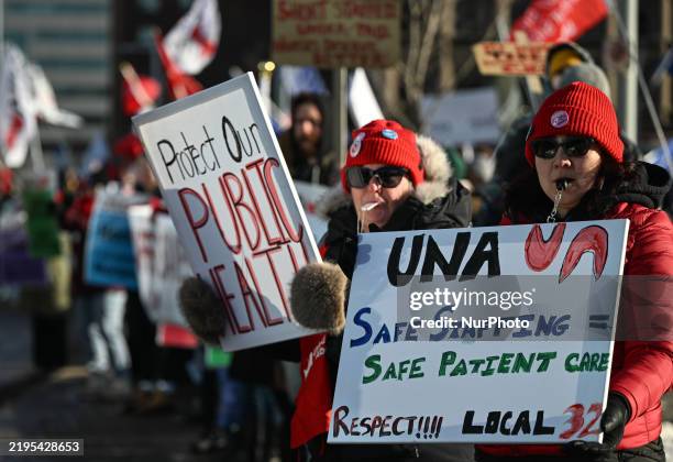 Alberta nurses rally outside the Edmonton General Continuing Care Centre on Jasper Avenue during UNA's Provincial Day of Action in Edmonton, Alberta,...