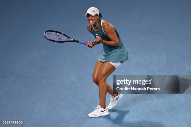 Madison Keys of the United States celebrates winning the match point against Iga Swiatek of Poland in the Women's Singles Semifinal during day 12 of...