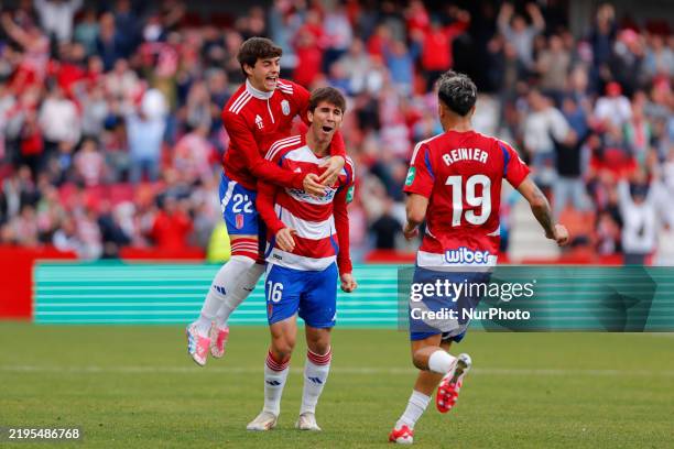 Manu Lama of Granada CF scores the 3-1 goal during the LaLiga Hypermotion match between Granada CF and Real Sporting de Gijon at Nuevo Los Carmenes...