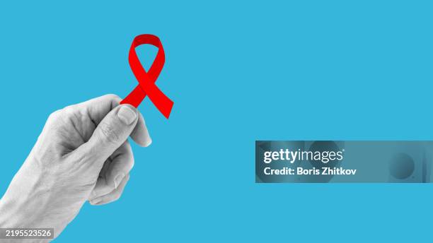 red awareness ribbon - aids stock pictures, royalty-free photos & images