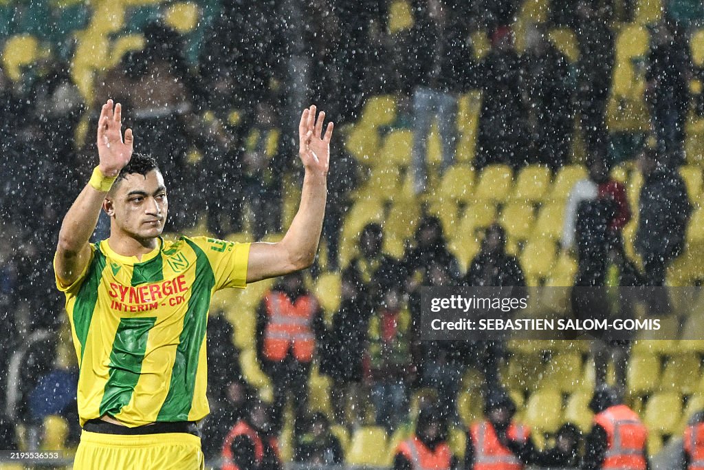 Mostafa Nantes' Egyptian forward Mostafa Mohamed gestures at the end of the ...
