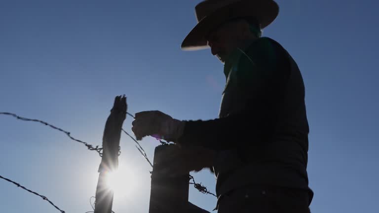 Fixing Ranch 112 Farmer Fixing Fence Stock Videos, Footage, & 4K Video Clips - Getty ...