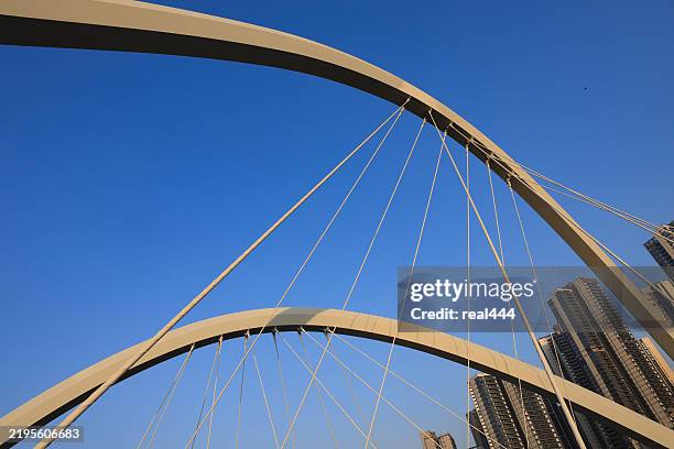 modern bridge - suspension bridge stock pictures, royalty-free photos & images