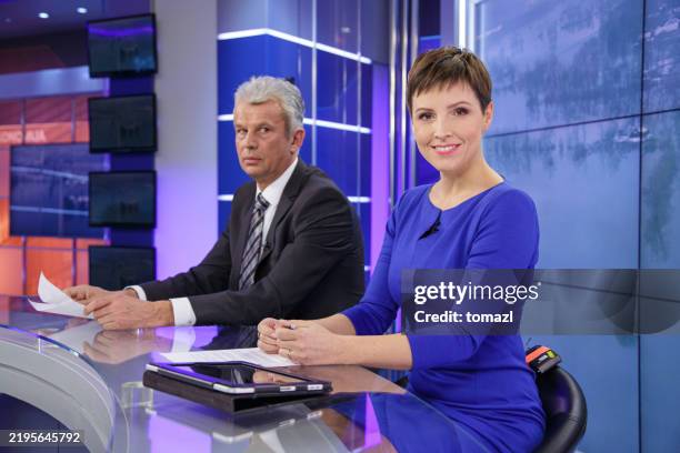 journalists in a tv news studio - presenter stock pictures, royalty-free photos & images