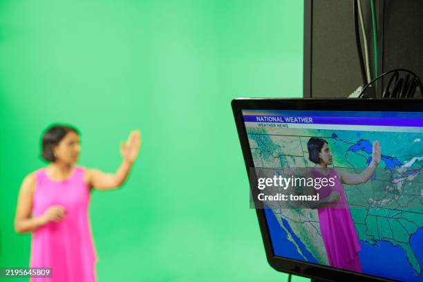 weather forecaster on green background - indian weather stock pictures, royalty-free photos & images